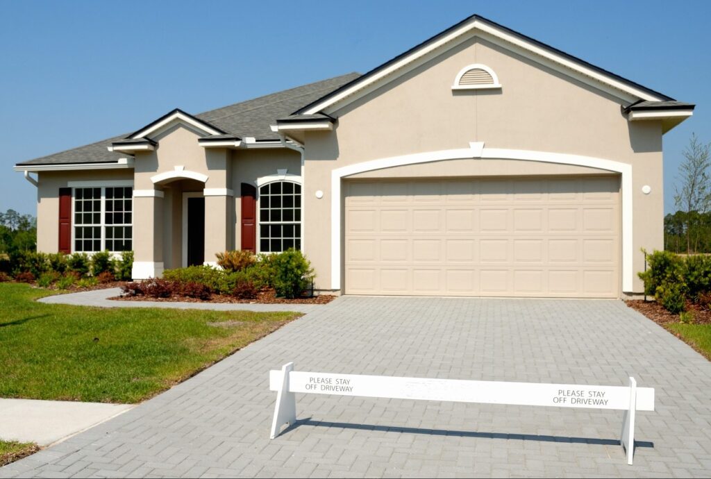 How to Clean Your Driveway Without Using a Power Washer